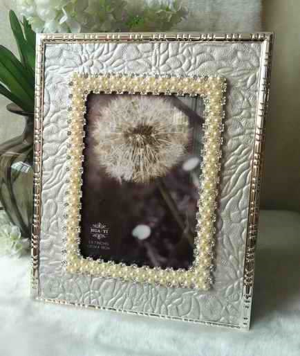 [X0100100023] PHOTO FRAMES